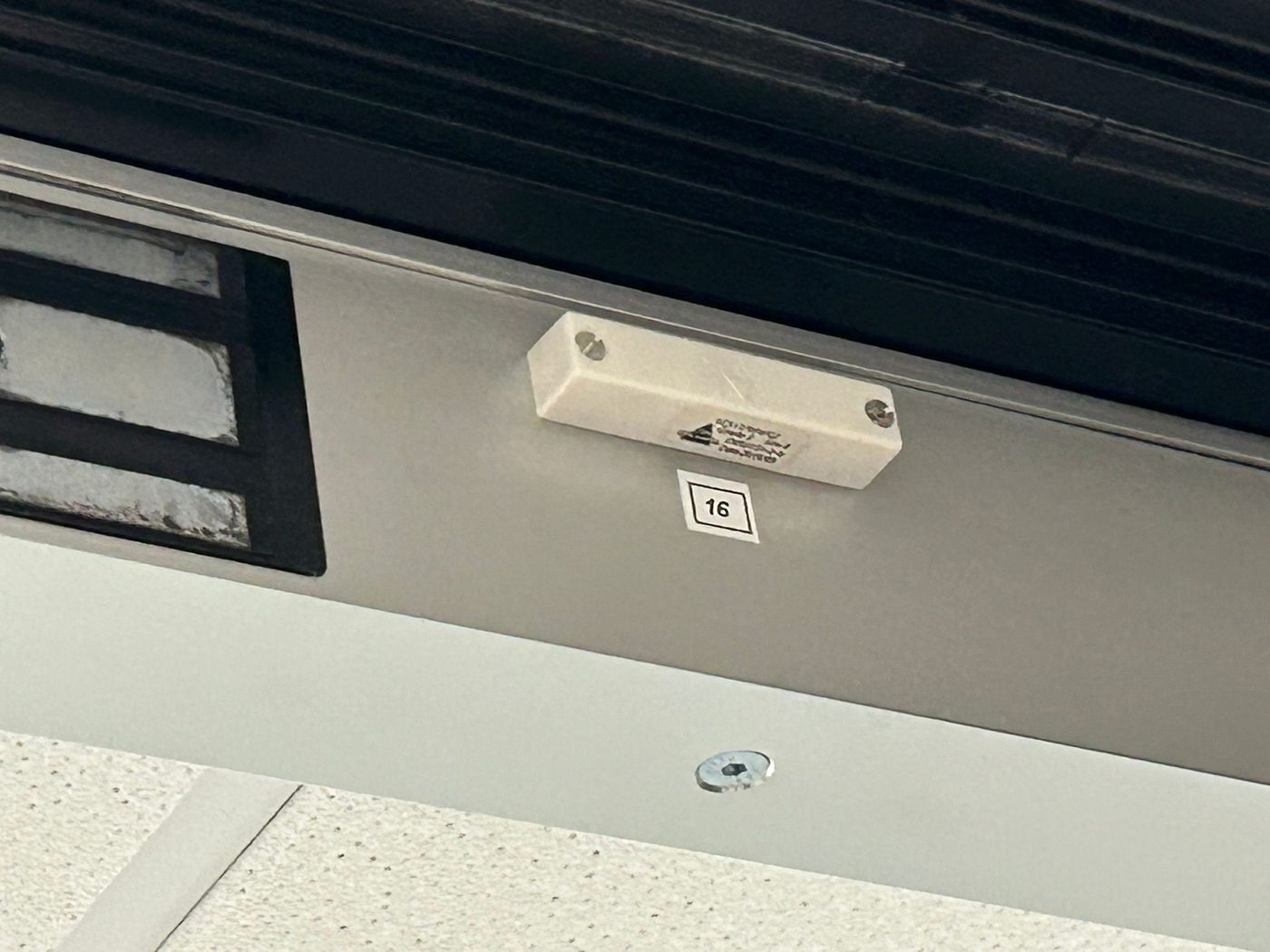 Intruder alarm door contact installed by Hawthorne